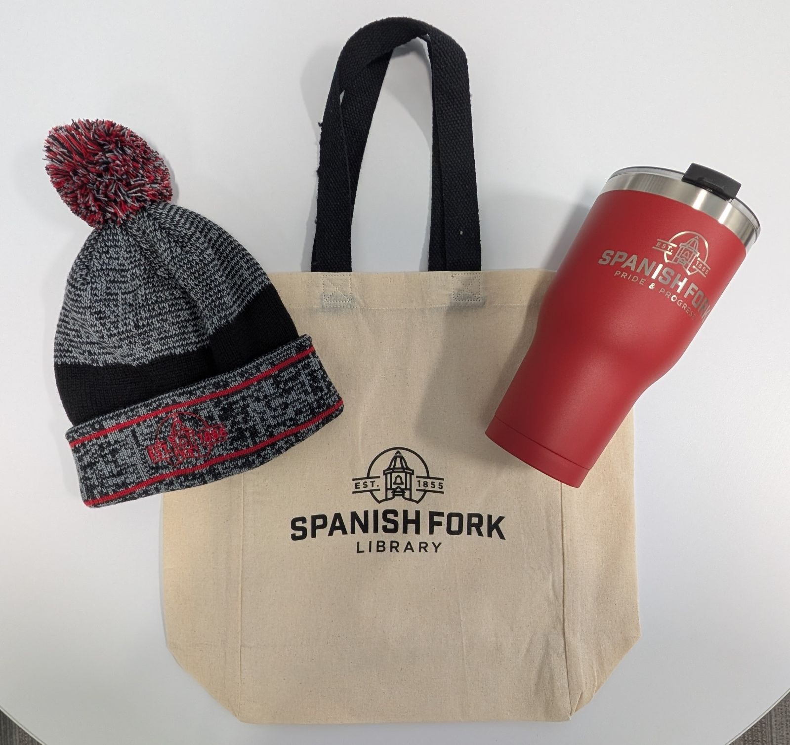 Spanish Fork Library bag with a Spanish Fork City beanie and tumbler