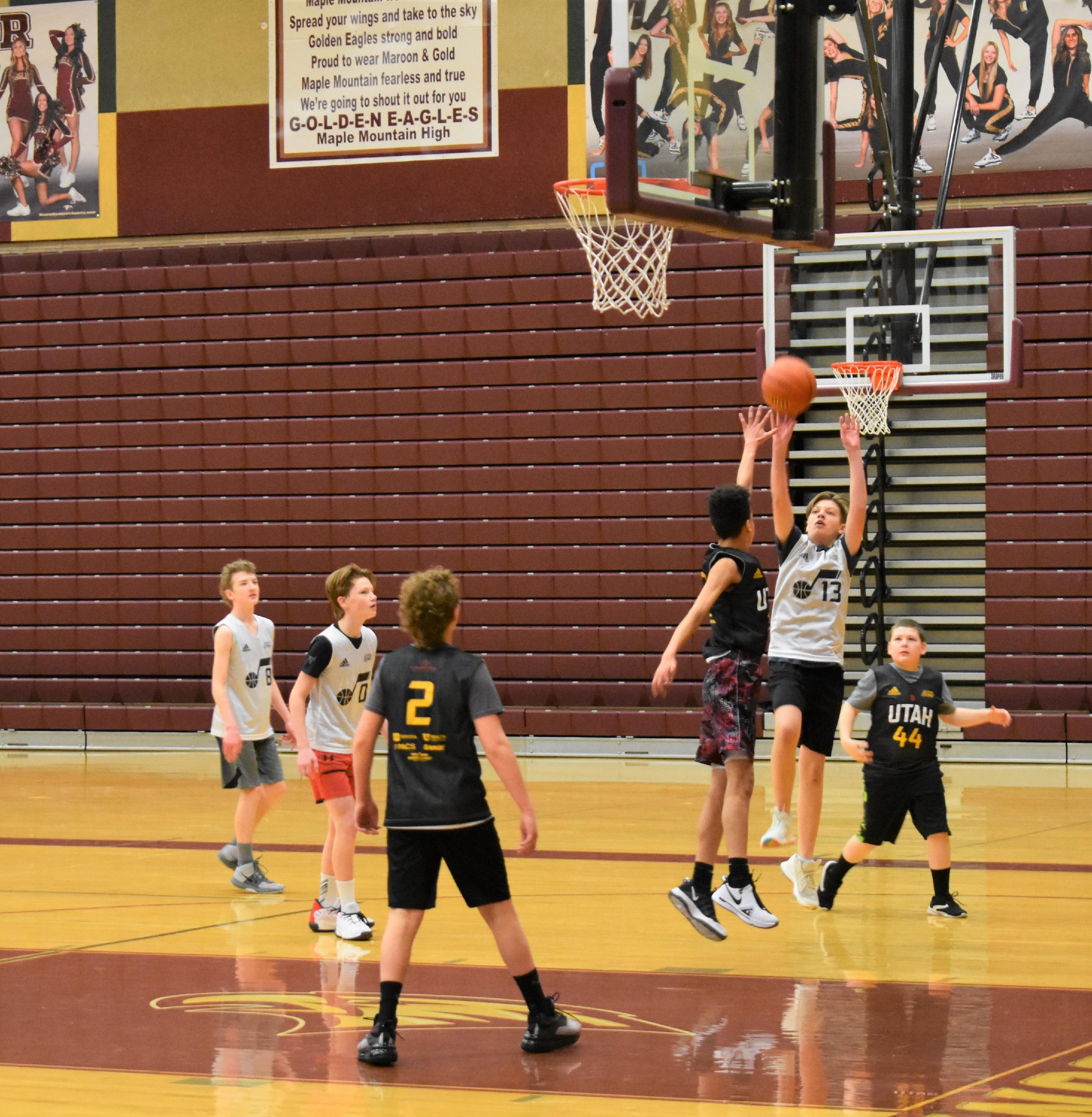 Boys playing basketball